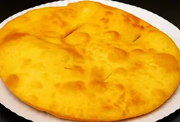 Bolinho de roda de carreta frito, dourado e crocante, receita simples e caseira tradicional
