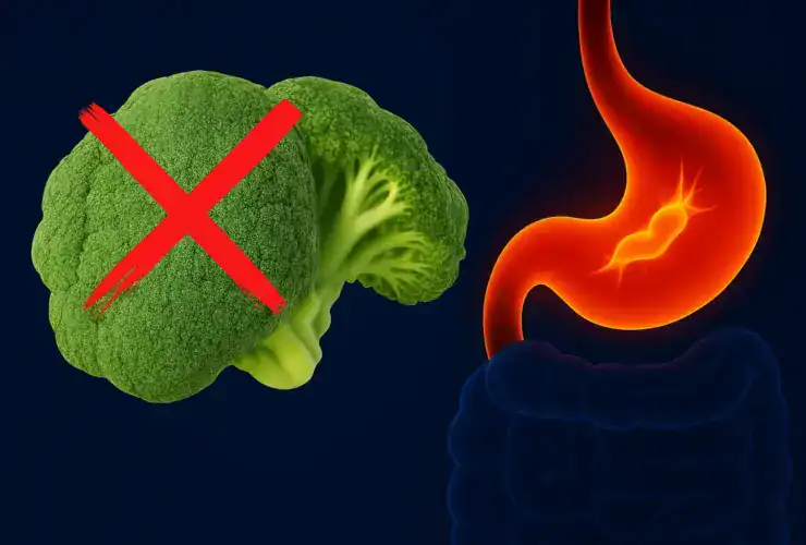 Ilustração mostrando o brócolis com um X vermelho ao lado de um estômago inflamado